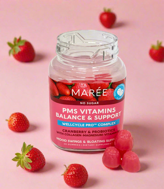 A bottle of MARÉE PMS Vitamins Balance & Support Gummies with natural strawberry flavor, alongside a few gummies displayed in front. The label indicates the product is sugar-free and contains cranberry, probiotics, and marine collagen among other ingredients.